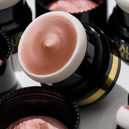 Home + Away Bronze-n-Brighten Kit (2 PC) lifestyle close up of Bronze-n-Brighten on the go