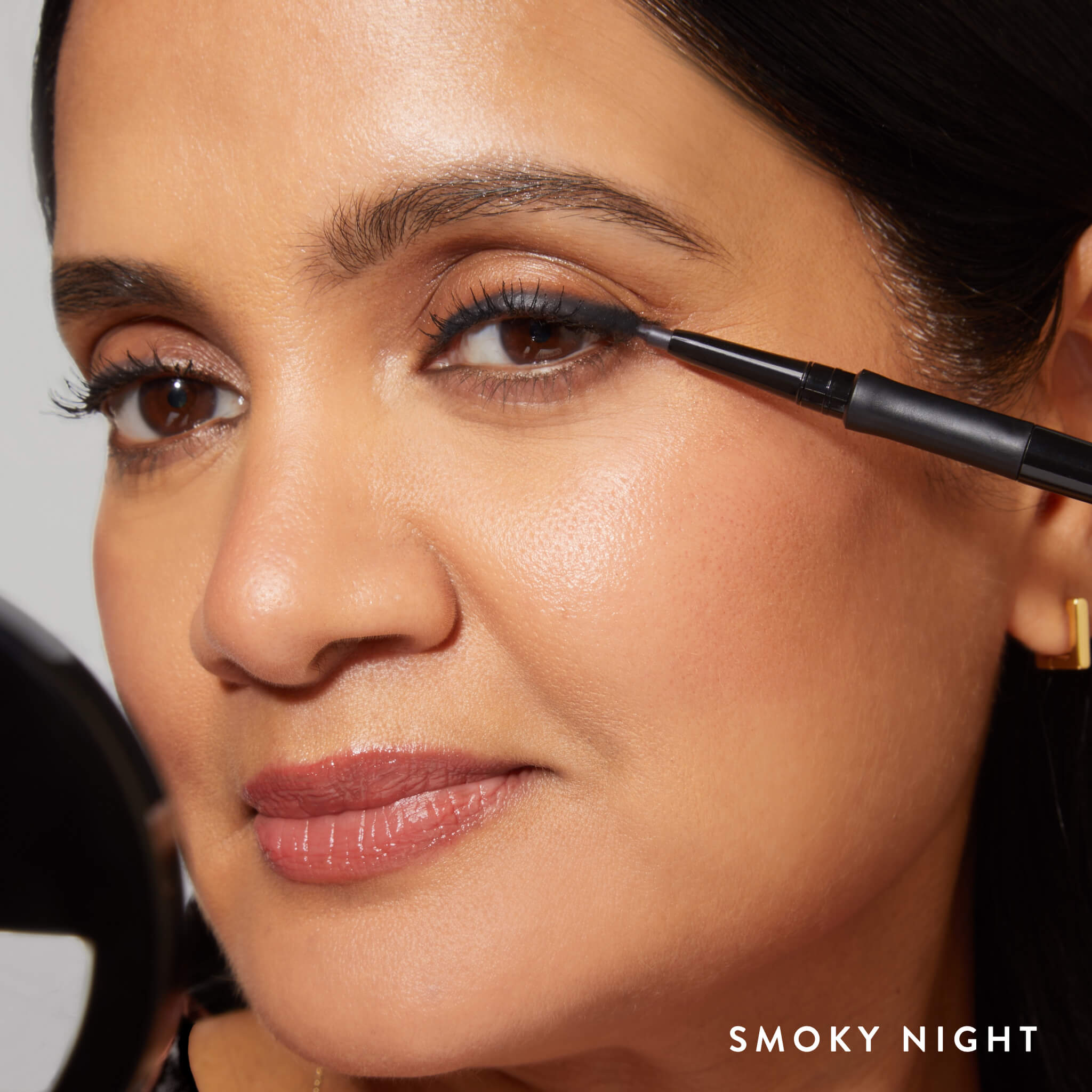 Model applying INKcredibles Smoky Night